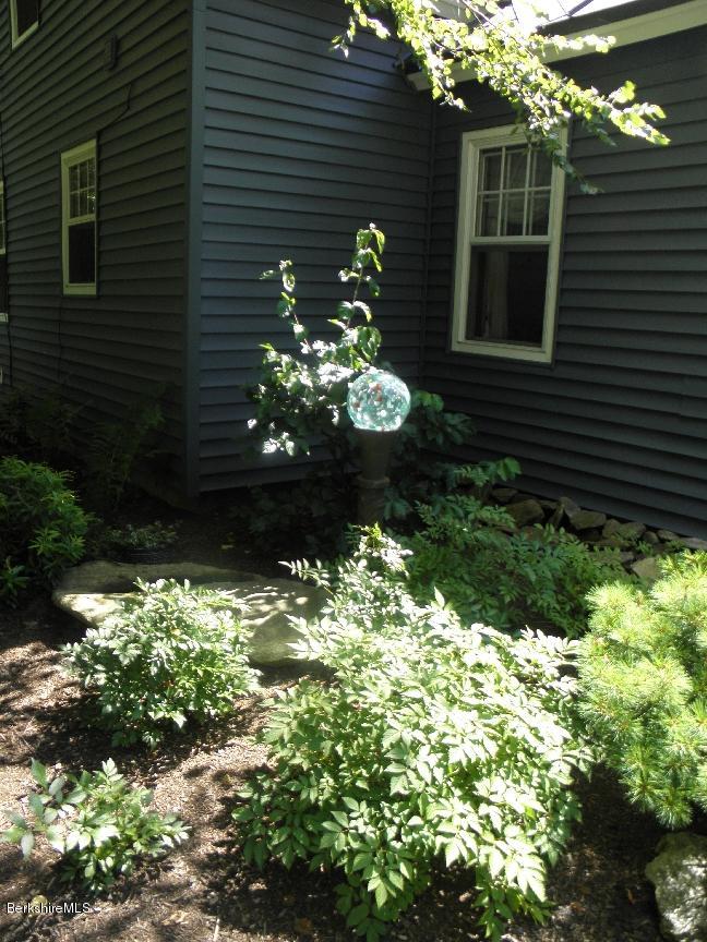 661 High St Hill Road Windsor, MA 01270 - Photo 10 of 75 a front view of a house with a yard