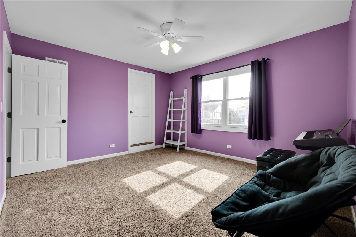 607 Cottage Road Batavia, IL 60510 - Photo 18 of 36 a bed room with furniture and a window