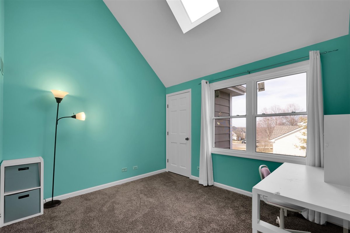 607 Cottage Road Batavia, IL 60510 - Photo 22 of 36 a view of an empty room with a window