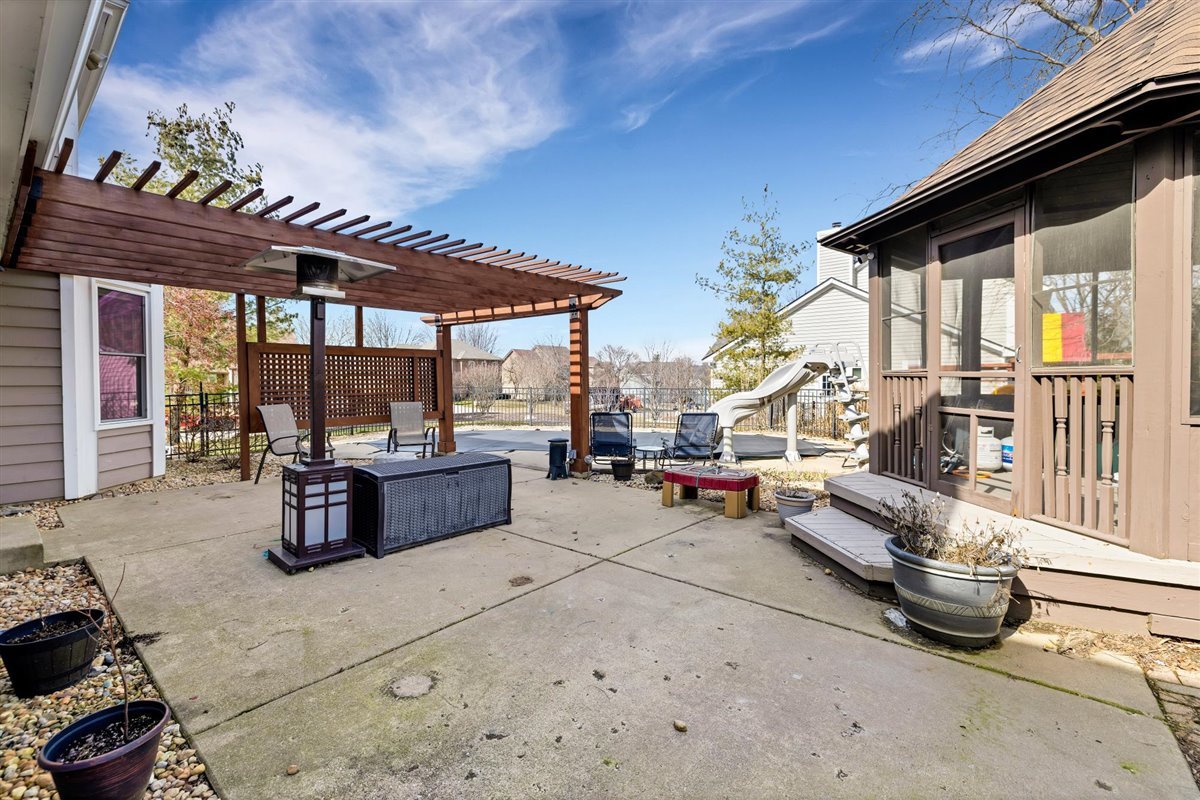 607 Cottage Road Batavia, IL 60510 - Photo 34 of 36 a view of patio with a table and chairs and potted plants