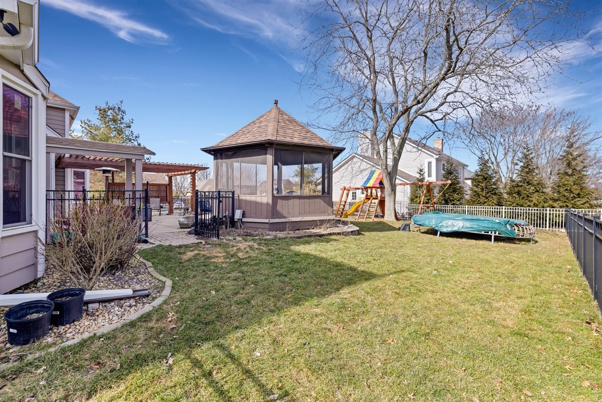 607 Cottage Road Batavia, IL 60510 - Photo 35 of 36 a front view of a house with a yard