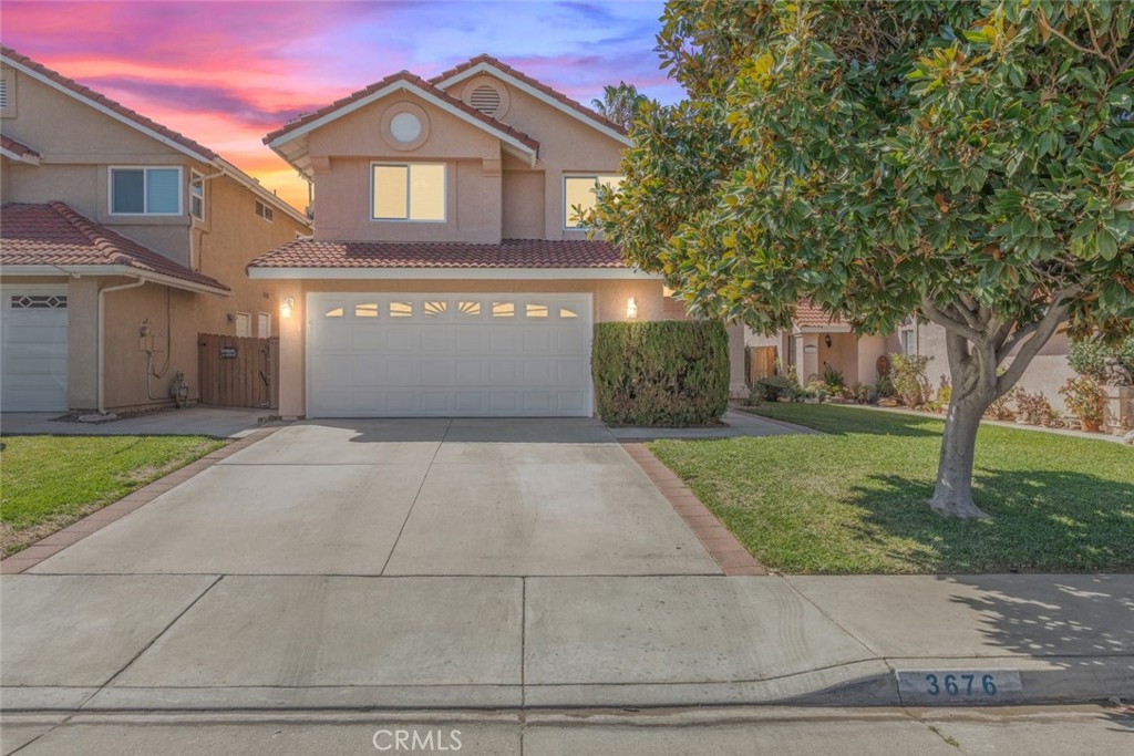 3676 Windstorm Way Riverside, CA 92503 - Photo 1 of 1 a view of a house with a yard