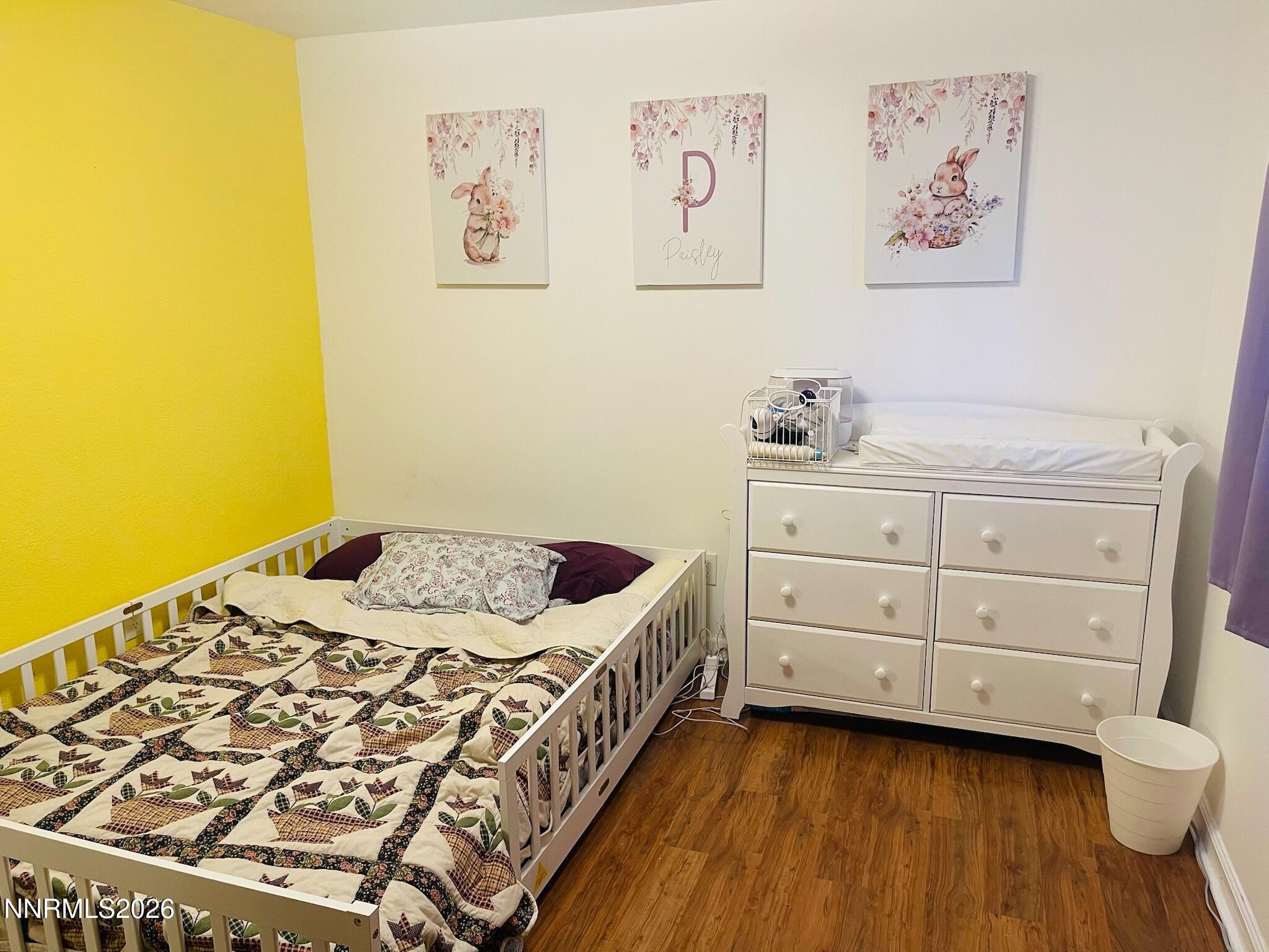 334 Kay Way Yerington, NV 89447 - Photo 11 of 22 a bedroom with a bed and cabinets