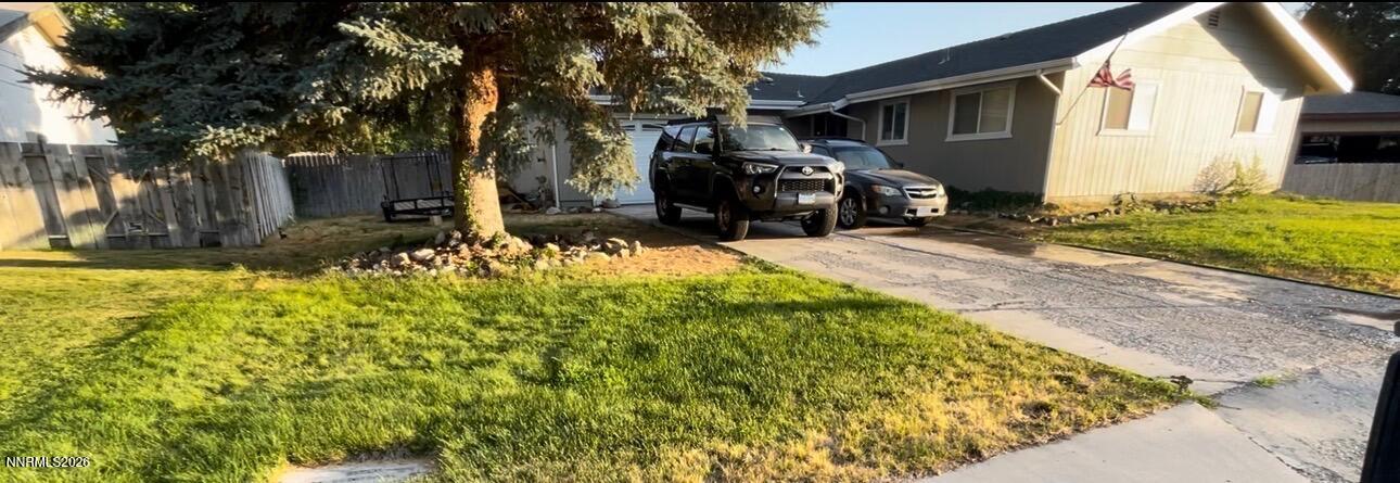 334 Kay Way Yerington, NV 89447 - Photo 2 of 22 a view of a house with a yard