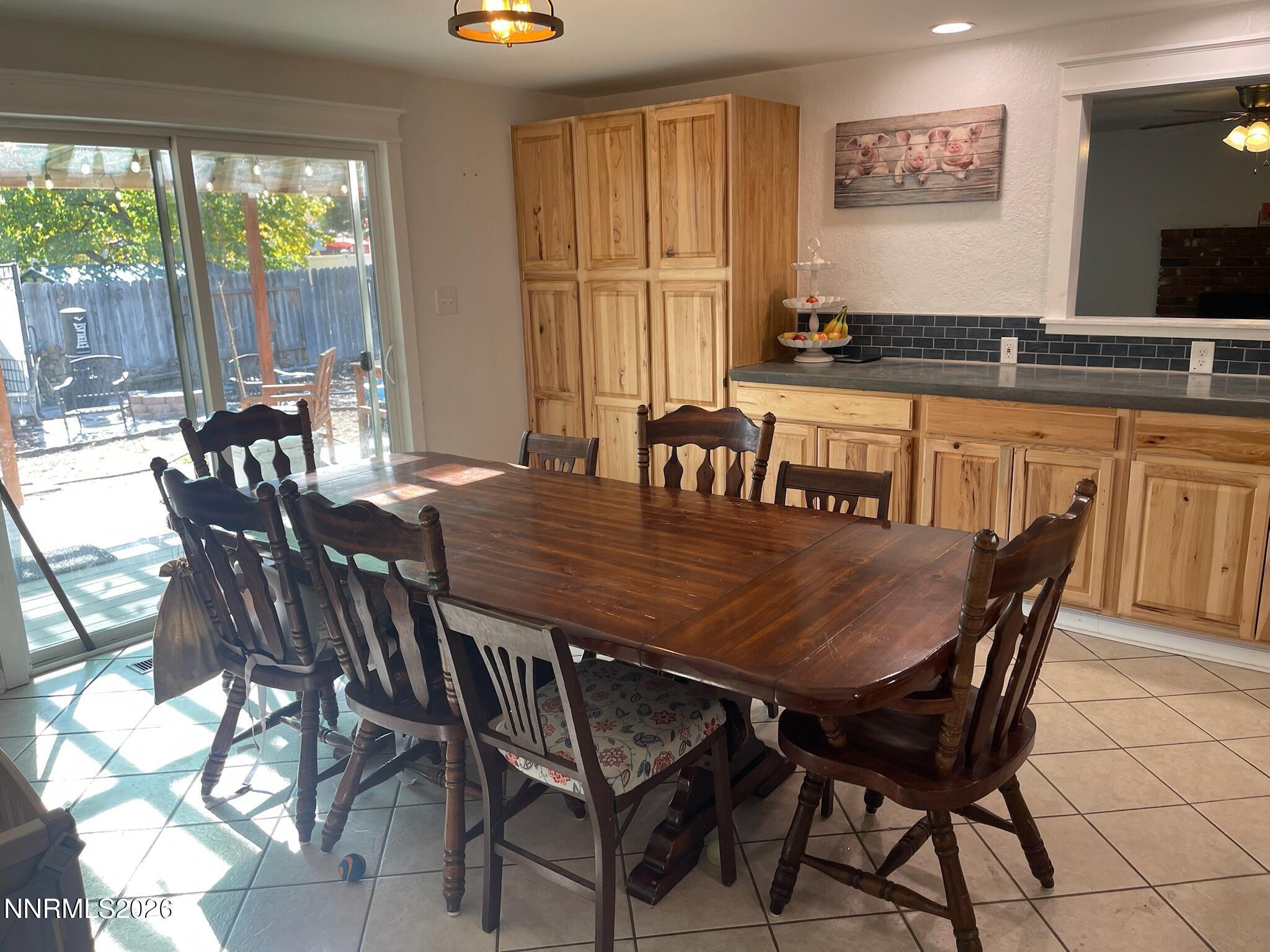 334 Kay Way Yerington, NV 89447 - Photo 8 of 22 a view of a a dining room with furniture window and outside view