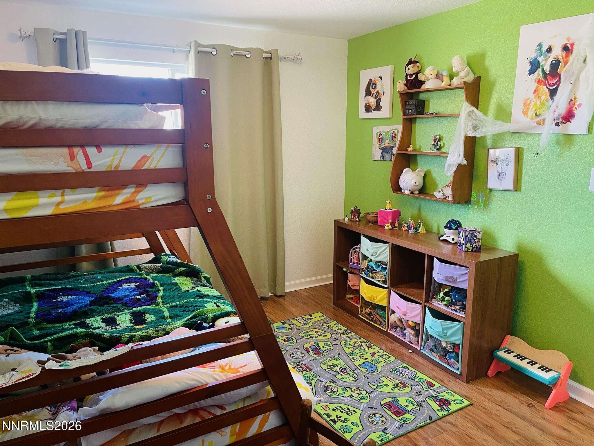 334 Kay Way Yerington, NV 89447 - Photo 10 of 22 a room with toys and wooden floor