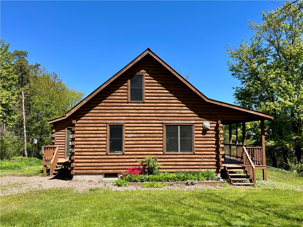 7560 North Huron Road Huron, NY 14590 - Photo 2 of 49 This amazing log sided home was built in 1997 as a