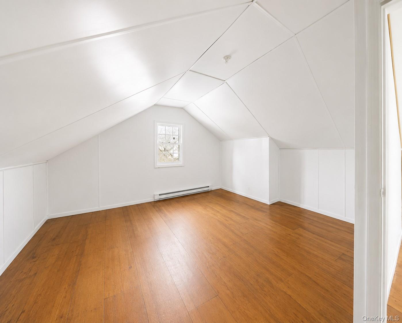55 Hasbrouck A Road Fallsburg, NY 12759 - Photo 6 of 8 a view of empty room with wooden floor
