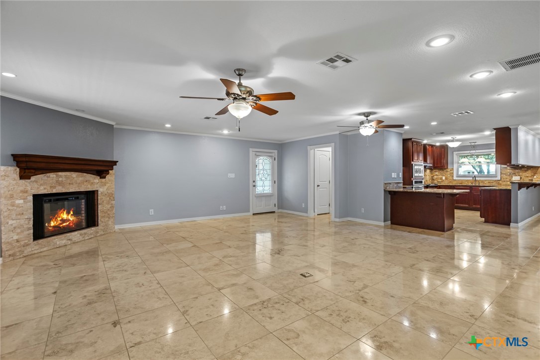3745-3735 Canyon Heights Road Belton, TX 76513 - Photo 12 of 33 a view of an empty room and fire place