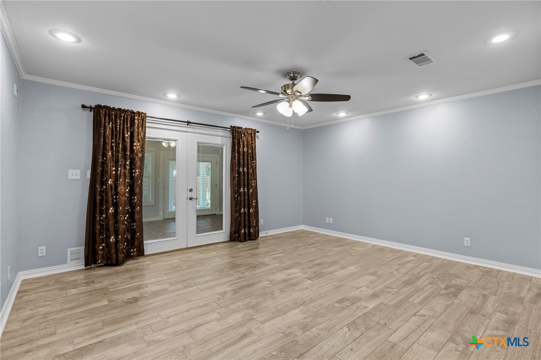 3745-3735 Canyon Heights Road Belton, TX 76513 - Photo 16 of 33 a view of an empty room with a window