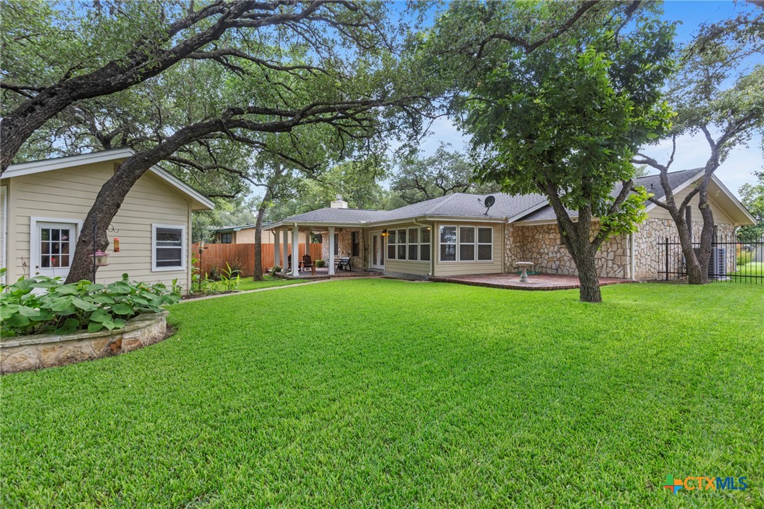 3745-3735 Canyon Heights Road Belton, TX 76513 - Photo 2 of 33 a view of house with a yard