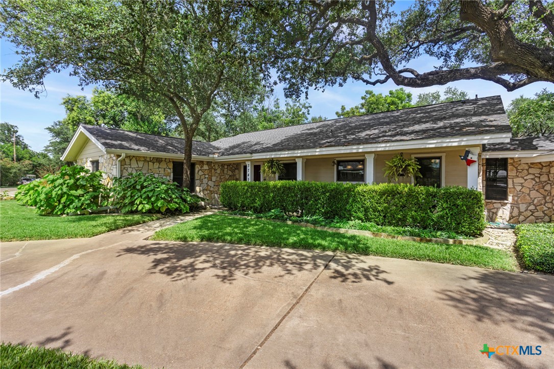 3745-3735 Canyon Heights Road Belton, TX 76513 - Photo 3 of 33 a house view with a garden space