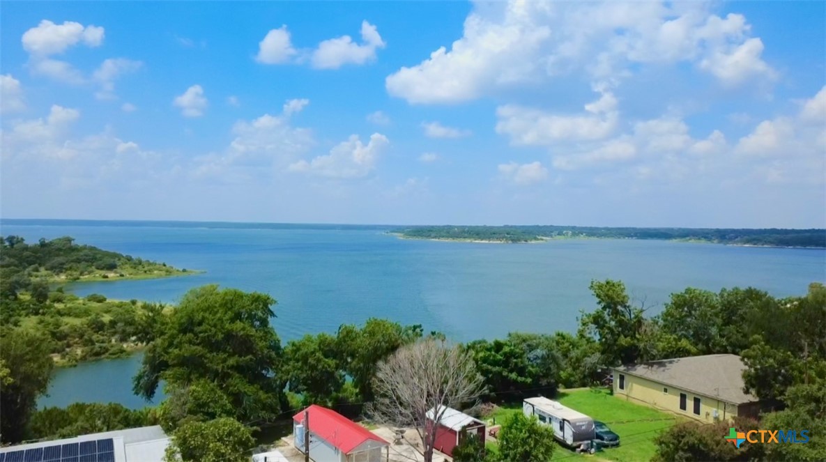 3745-3735 Canyon Heights Road Belton, TX 76513 - Photo 33 of 33 a view of a lake from a yard
