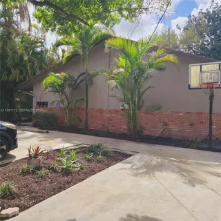 a plant in front of a house