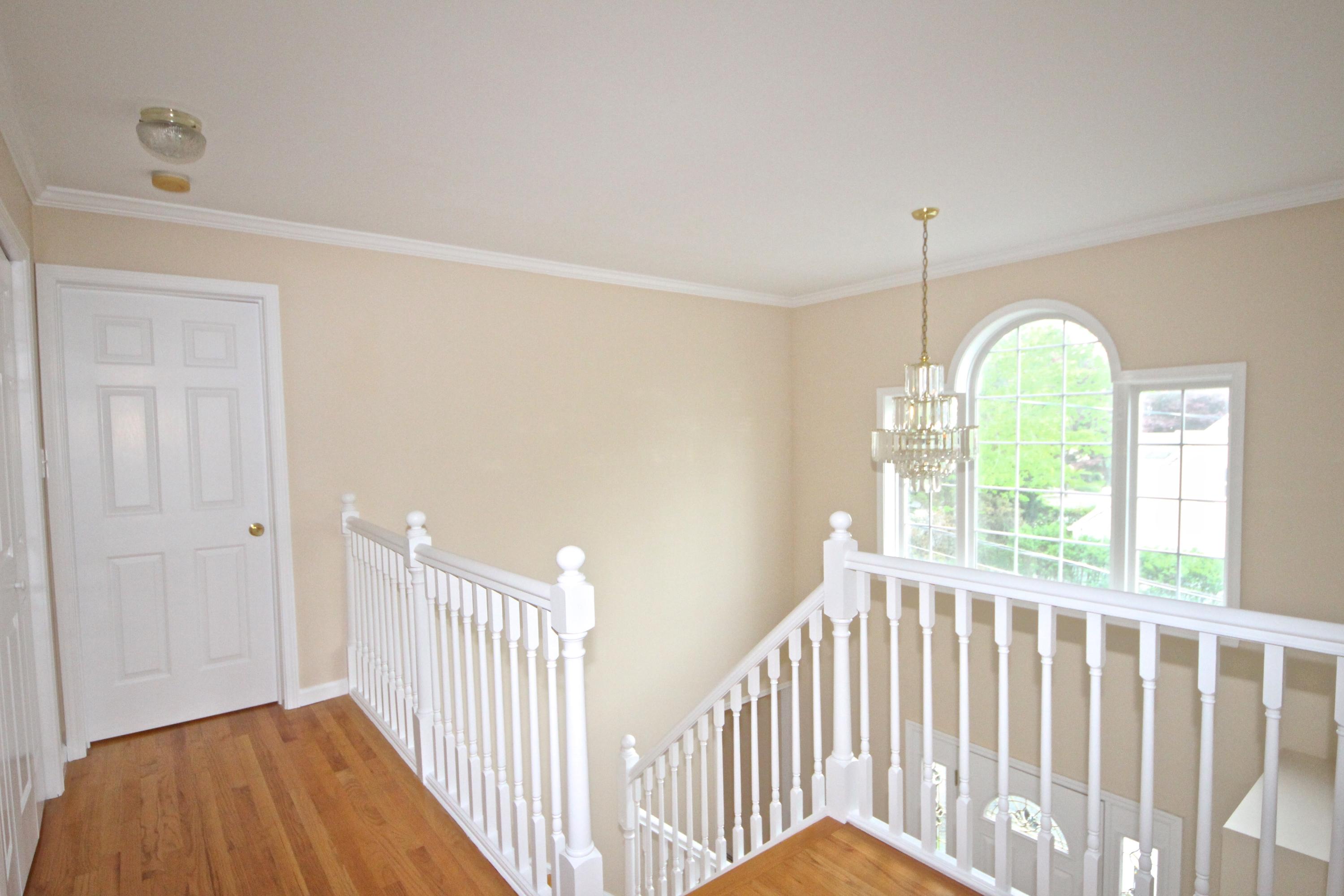 189 Hollow Tree Ridge Road Darien, CT 06820 - Photo 15 of 27 a view of entryway with wooden floor