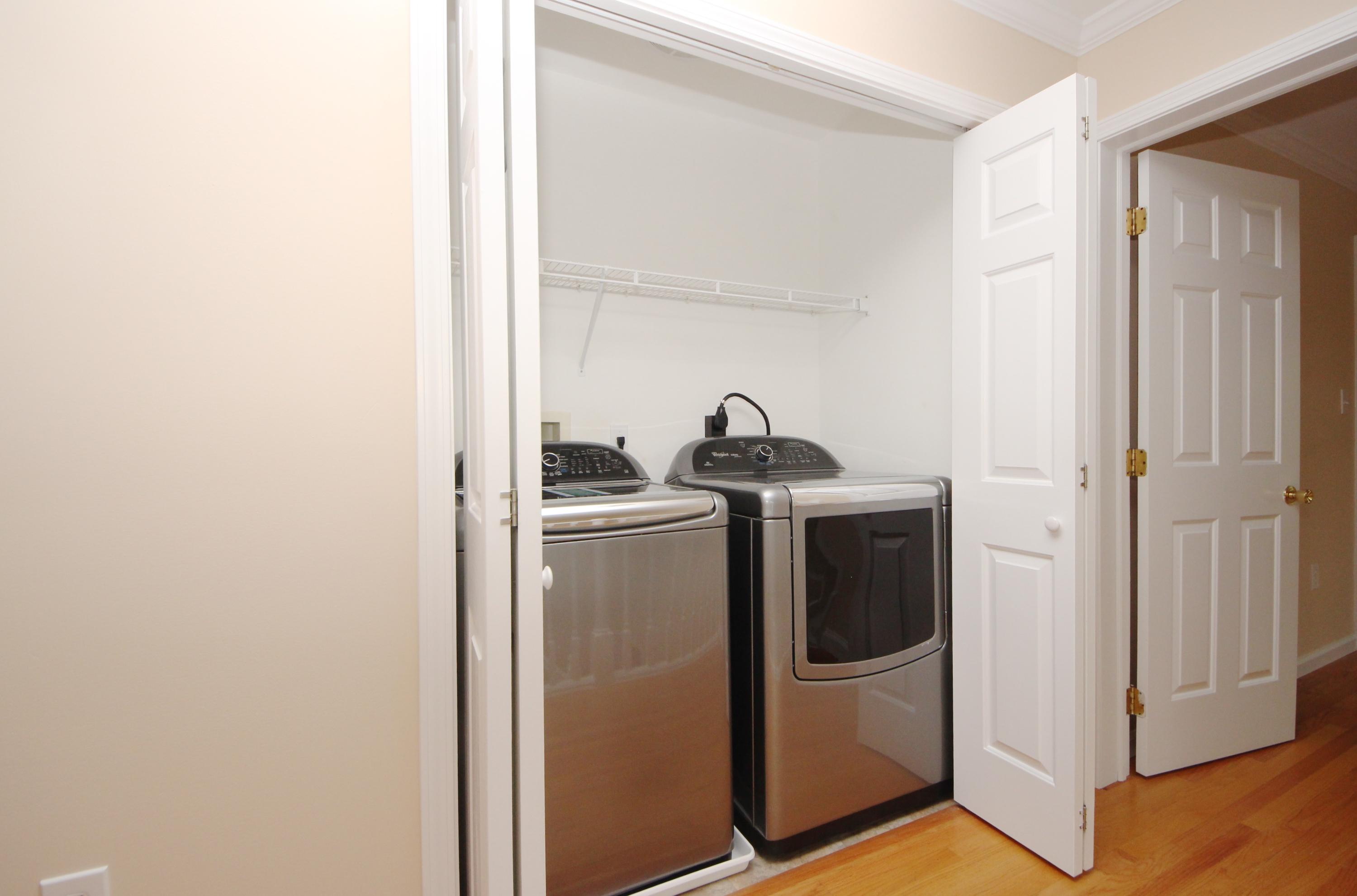 189 Hollow Tree Ridge Road Darien, CT 06820 - Photo 24 of 27 a utility room with dryer and washer
