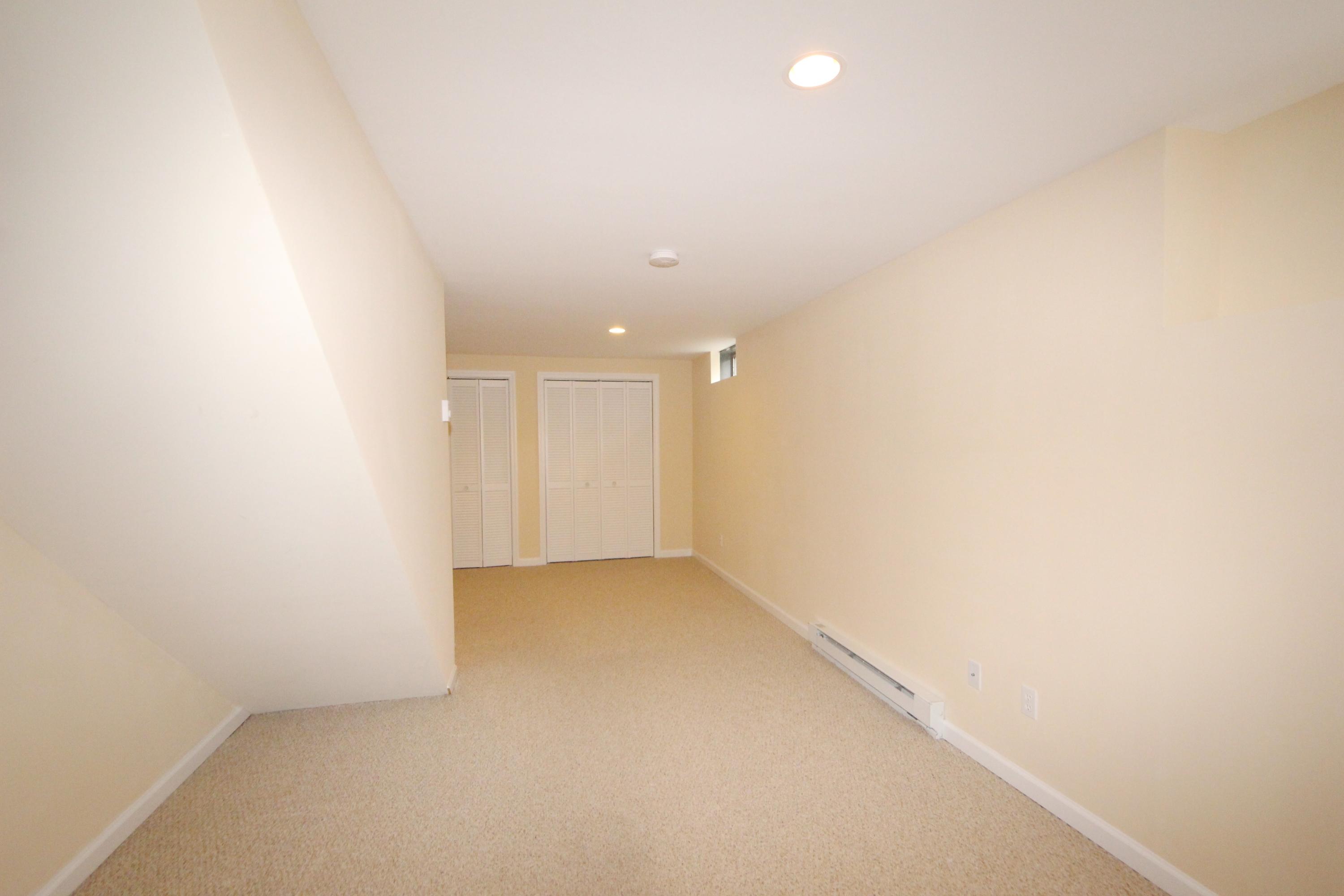 189 Hollow Tree Ridge Road Darien, CT 06820 - Photo 25 of 27 a view of an empty room
