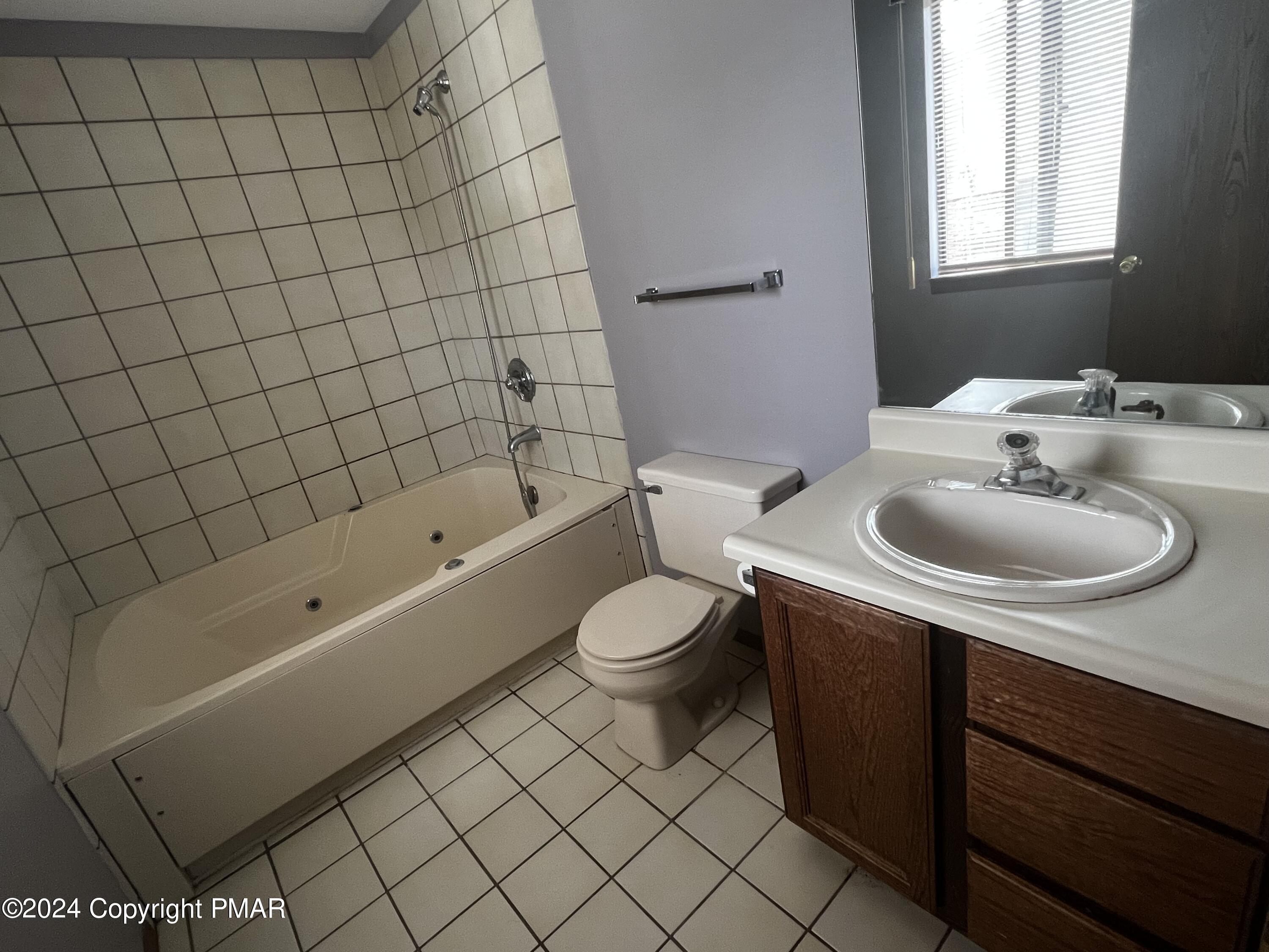 509 Wales Court Bushkill, PA 18324 - Photo 11 of 22 a bathroom with a sink toilet and shower