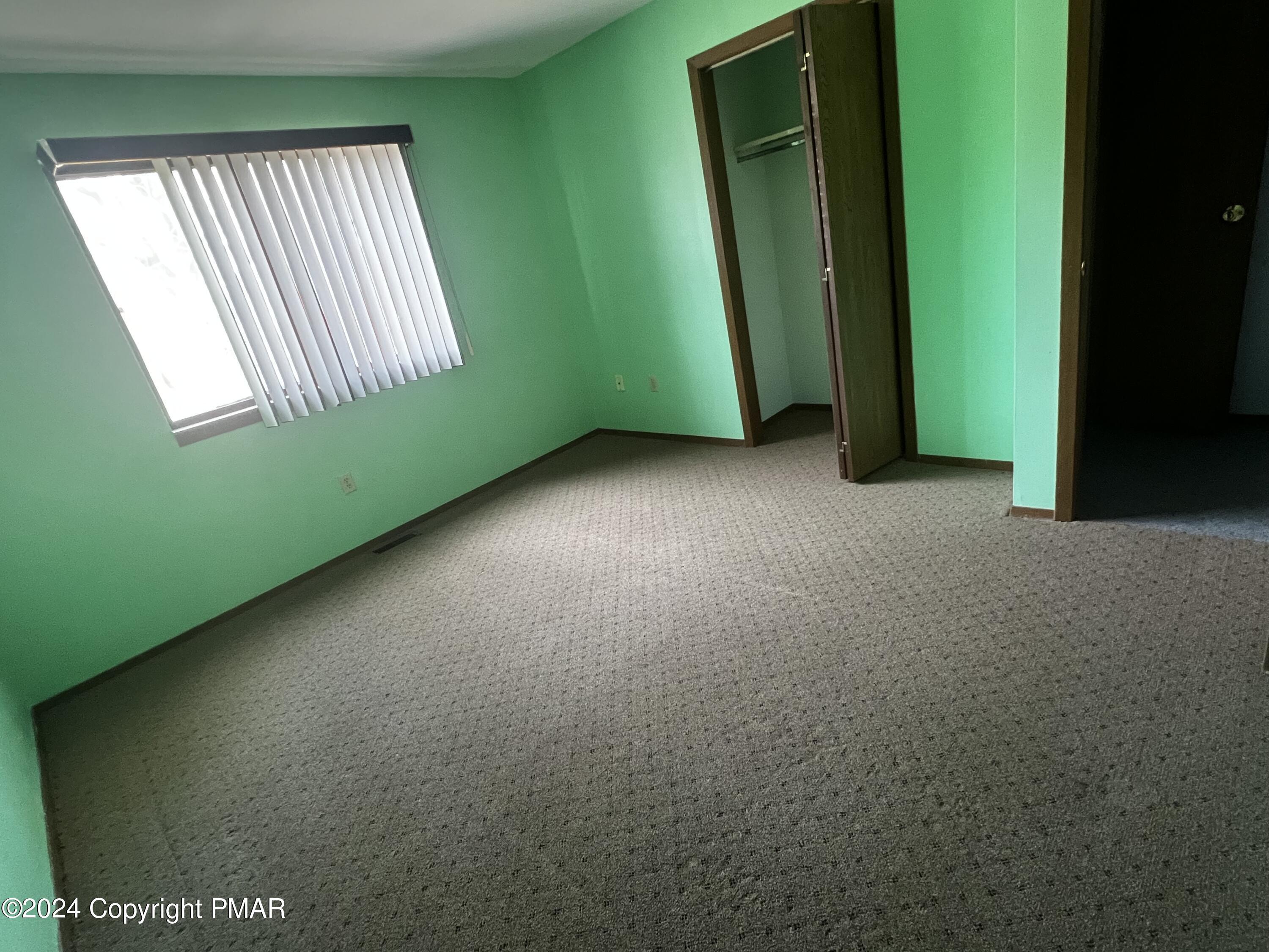 509 Wales Court Bushkill, PA 18324 - Photo 12 of 22 a view of empty room with window