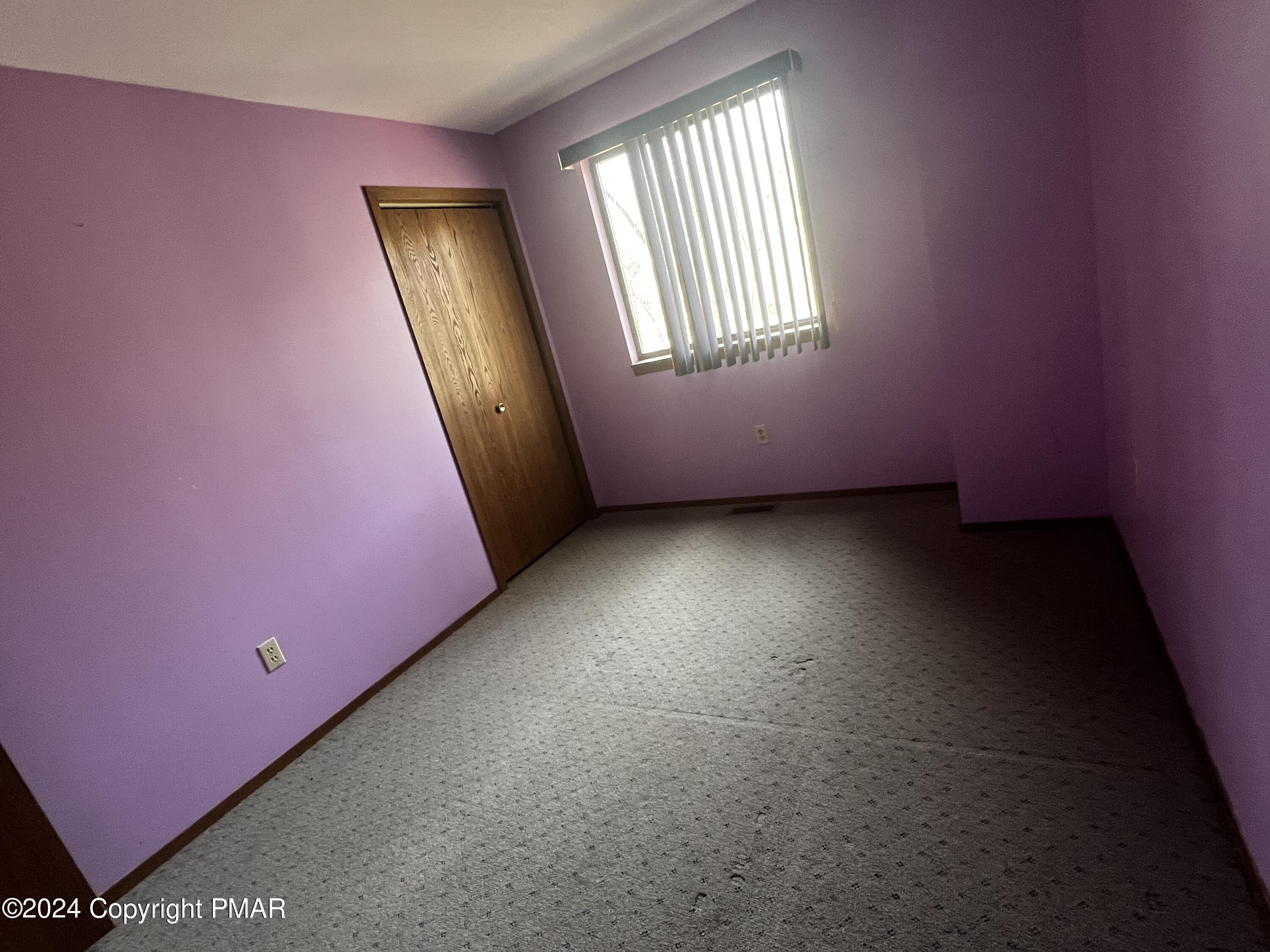 509 Wales Court Bushkill, PA 18324 - Photo 13 of 22 an empty room with windows