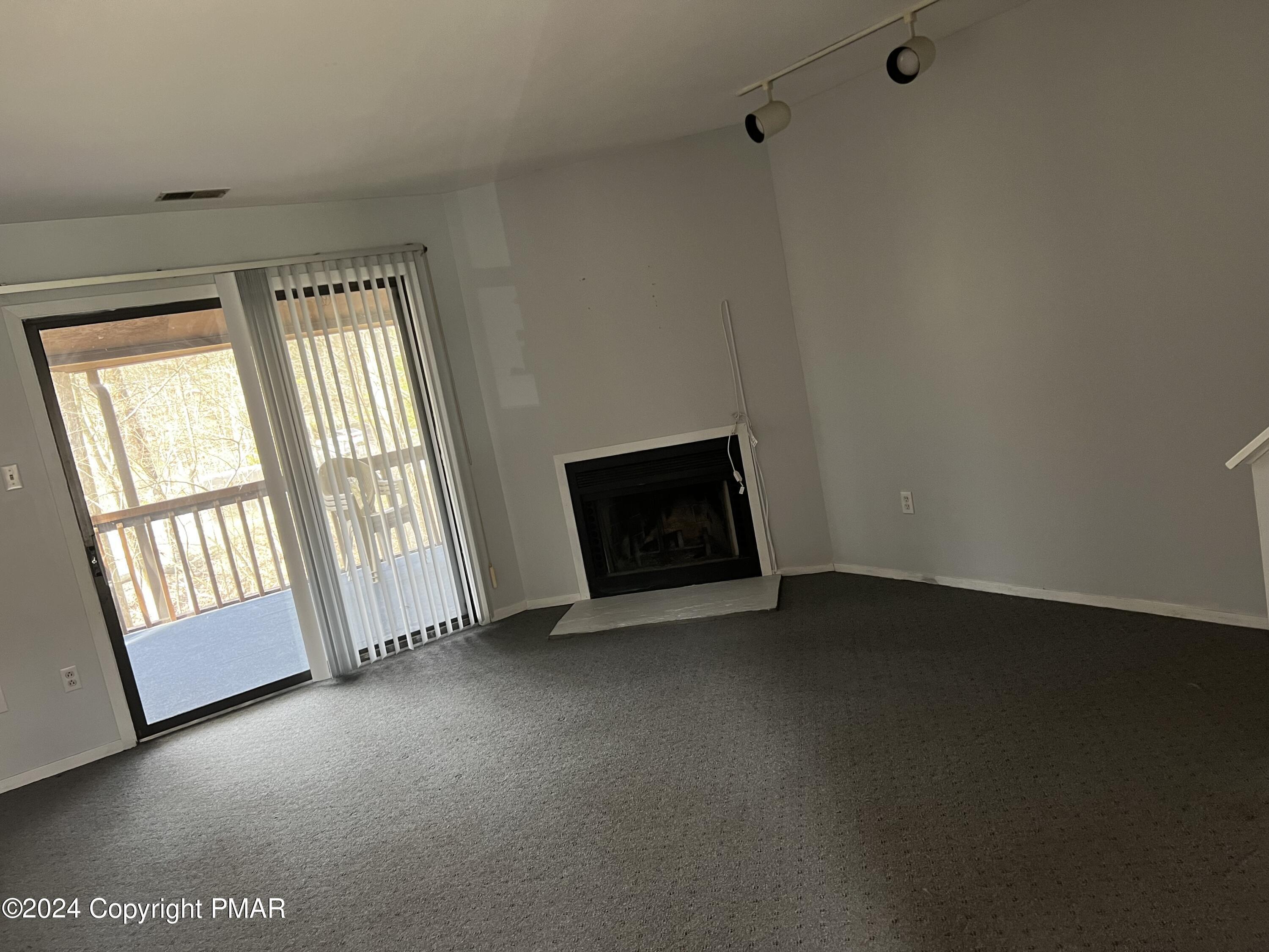 509 Wales Court Bushkill, PA 18324 - Photo 2 of 22 a view of an empty room with a window