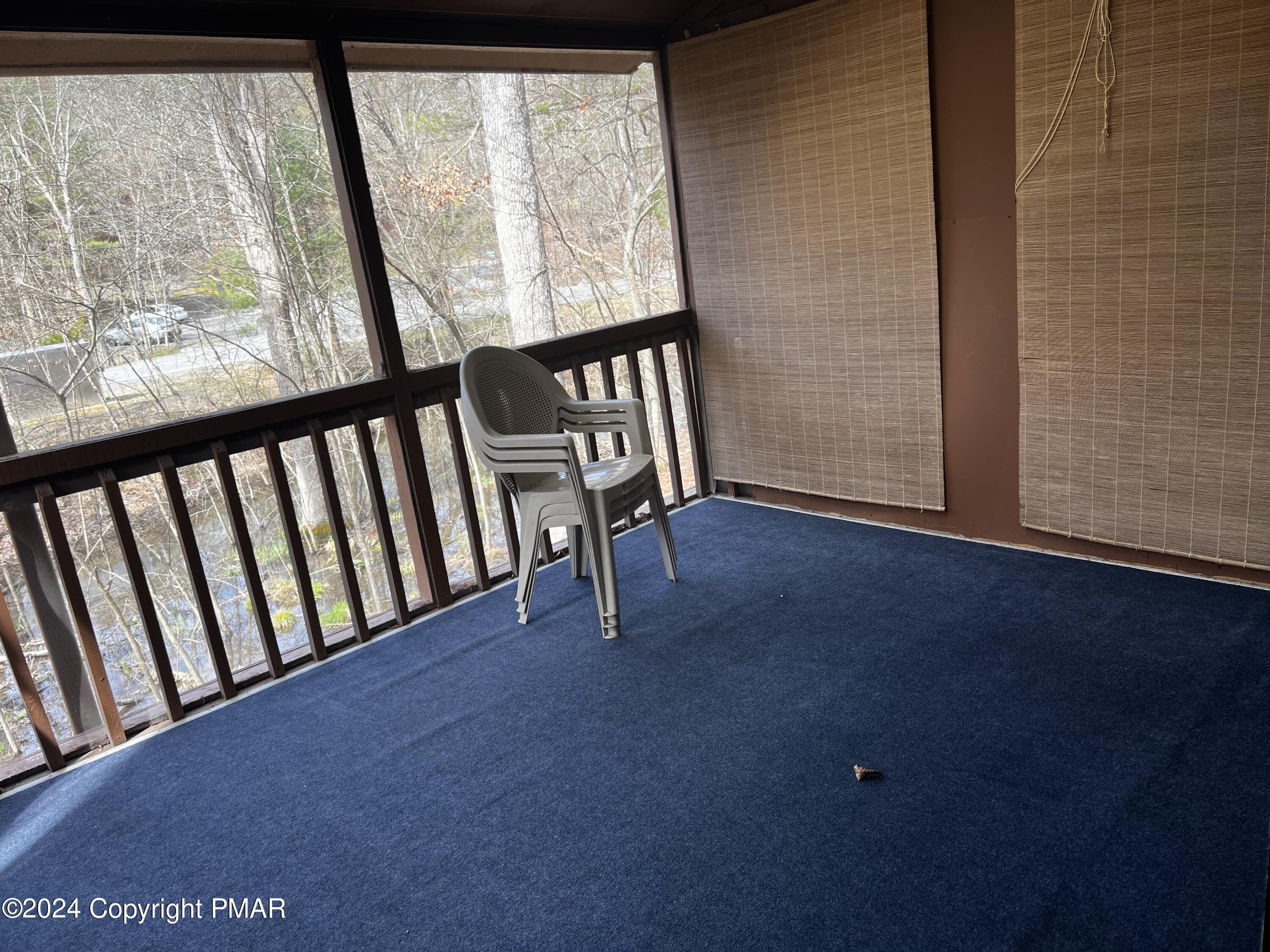 509 Wales Court Bushkill, PA 18324 - Photo 7 of 22 a view of an empty room with wooden floor and a window