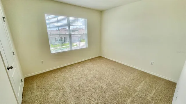 an empty room with a window