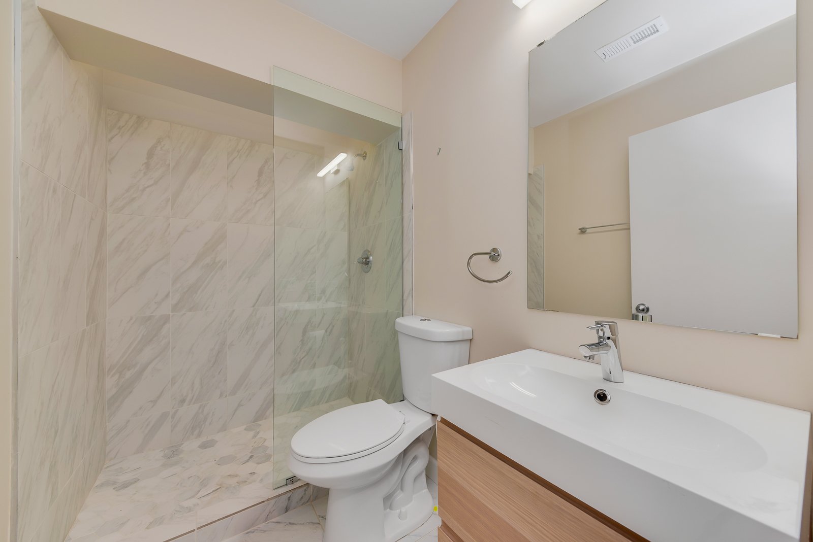 641 West Willow Street, Unit 140 Chicago, IL 60614 - Photo 15 of 22 a bathroom with a sink a toilet and shower