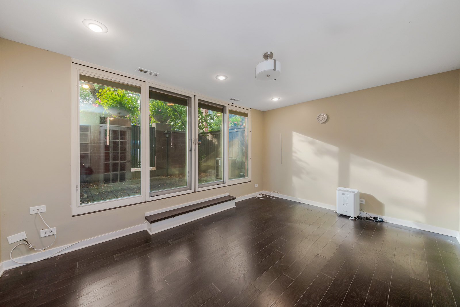641 West Willow Street, Unit 140 Chicago, IL 60614 - Photo 5 of 22 a view of empty room with wooden floor and fan