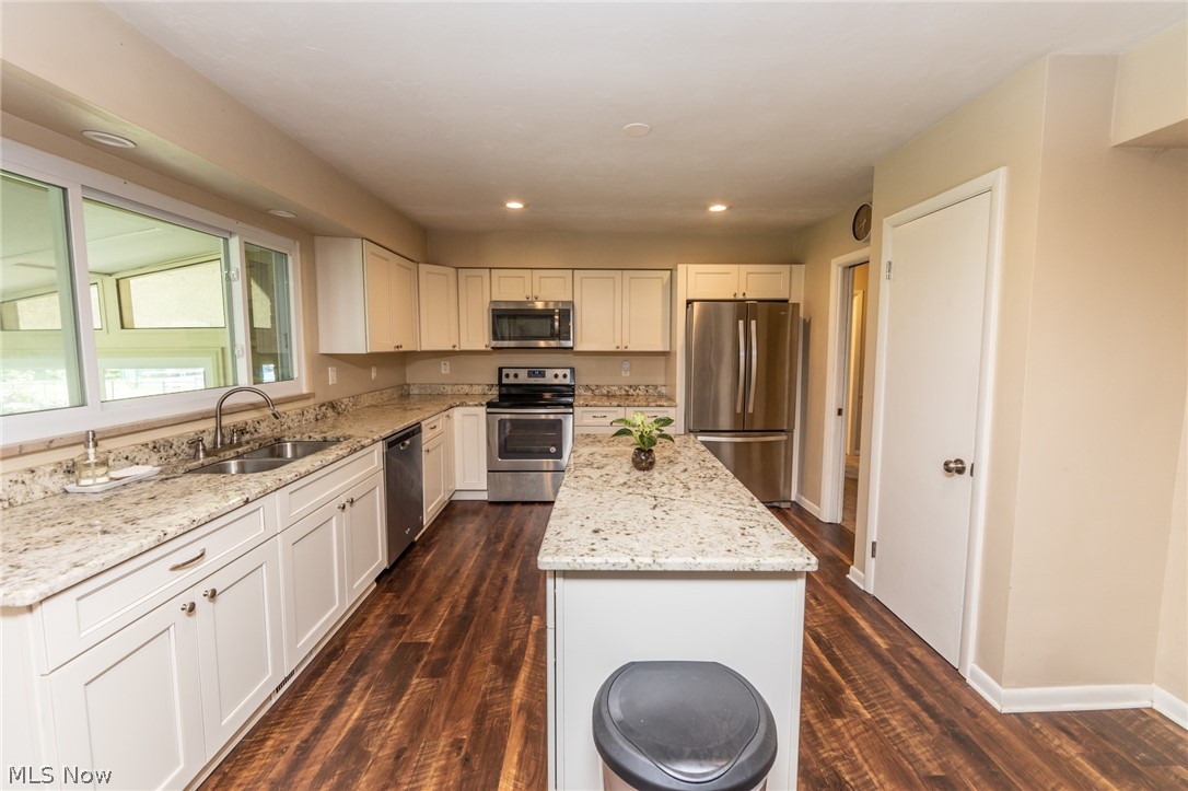 13145 East Bagley Road Cleveland, OH 44130 - Photo 12 of 35 Imagine cooking & baking in this beautiful kitchen with that island and so much storage!