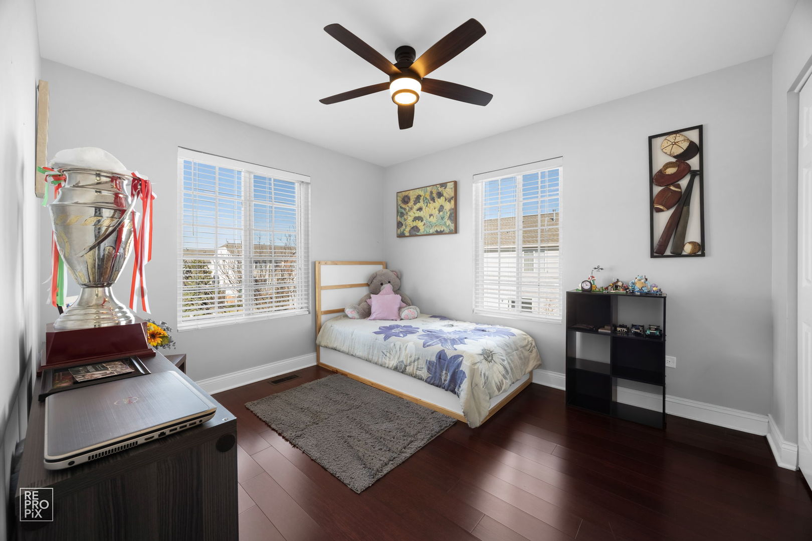 7504 Claridge Drive, Unit E Bridgeview, IL 60455 - Photo 17 of 25 a bedroom with a bed and a window
