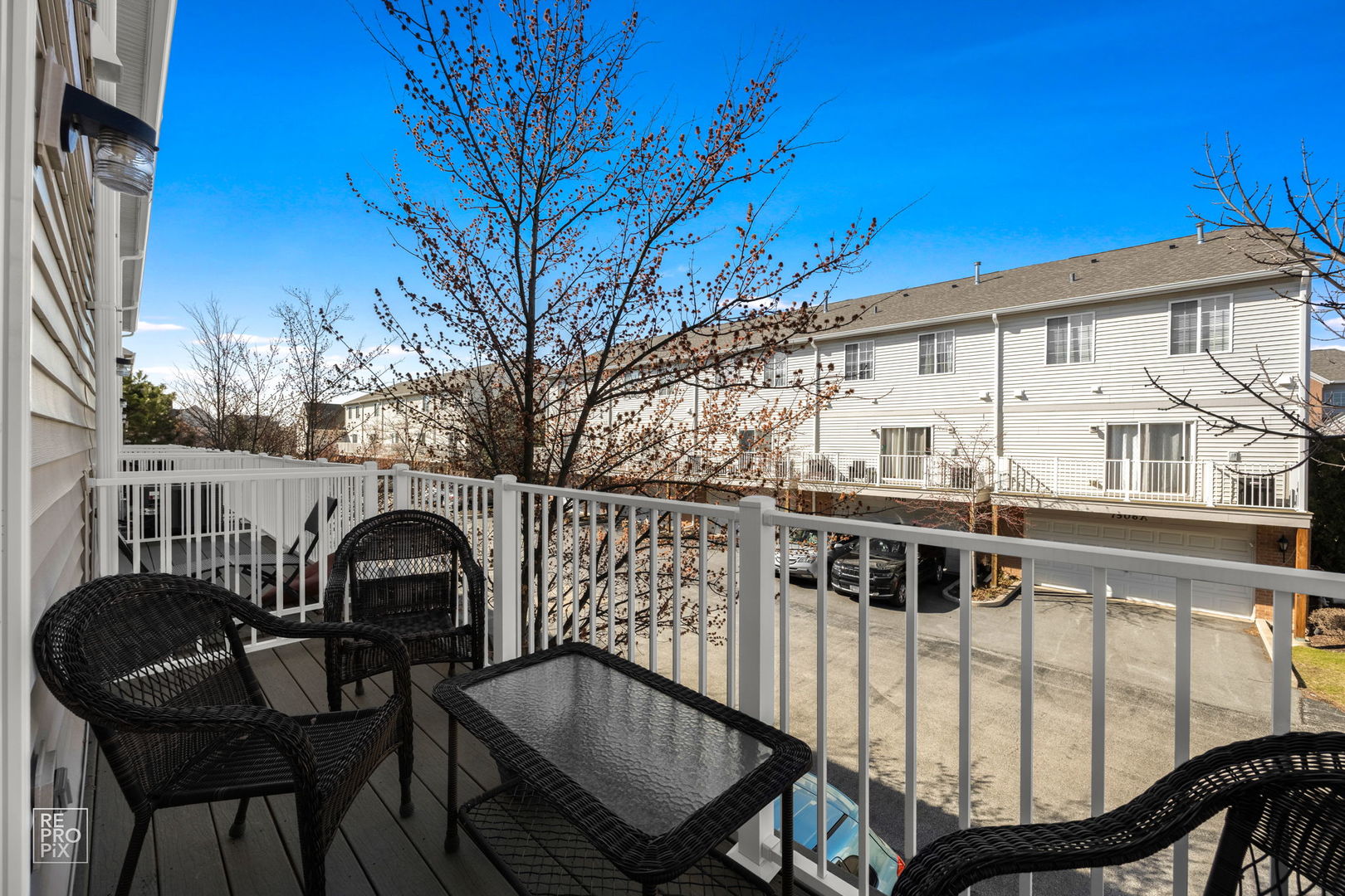 7504 Claridge Drive, Unit E Bridgeview, IL 60455 - Photo 23 of 25 a view of a balcony with chairs