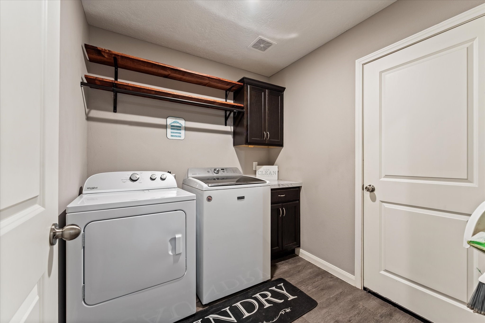 3998 Frontier Road Willis, TX 77378 - Photo 8 of 33 a utility room with dryer and washer
