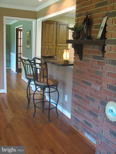 7218 Wilson Road Marshall, VA 20115 - Photo 3 of 30 a dining room with furniture and wooden floor