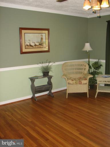 7218 Wilson Road Marshall, VA 20115 - Photo 21 of 30 a living room with furniture and a wooden floor
