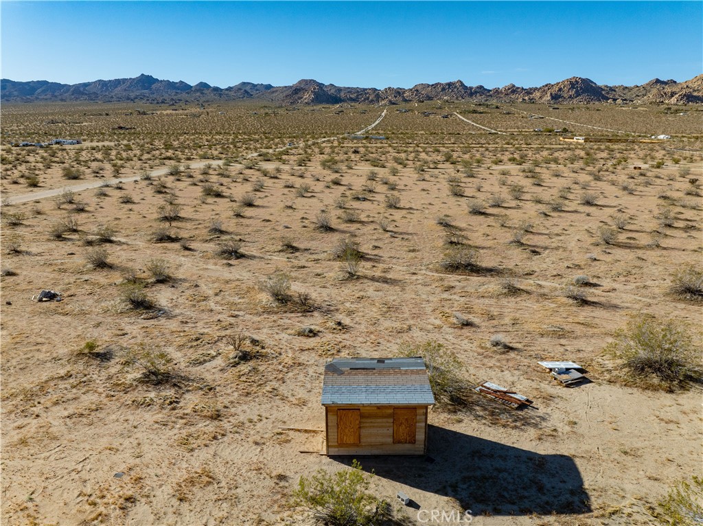 0 Sunever Avenue Joshua Tree, CA 92252 - Photo 2 of 26 a view of outdoor space and mountain view