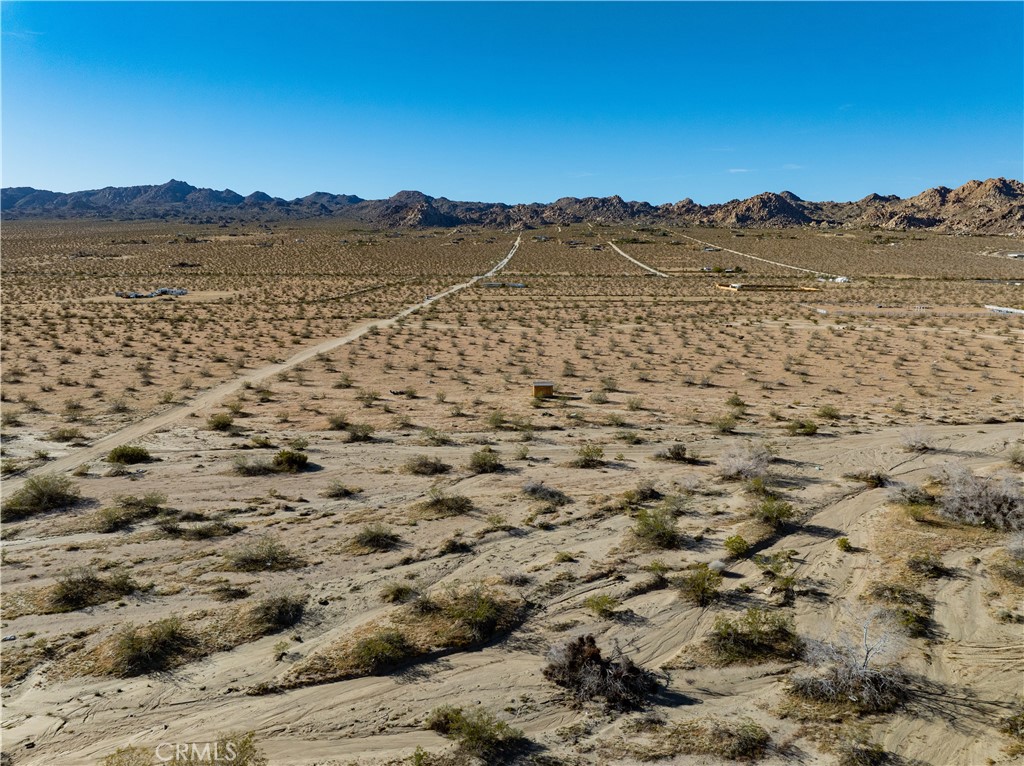 0 Sunever Avenue Joshua Tree, CA 92252 - Photo 24 of 26 a view of a mountain in the distance