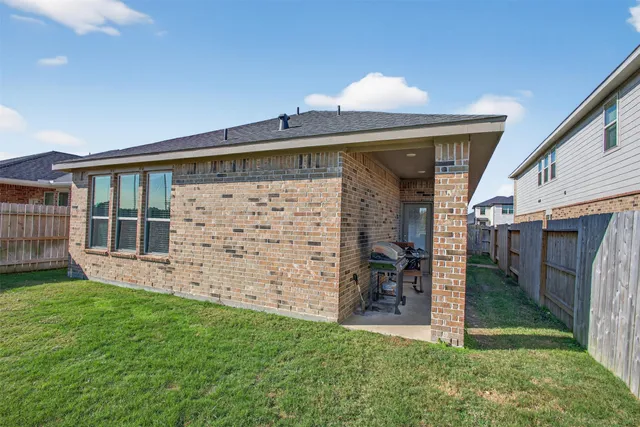 a view of a porch with a backyard