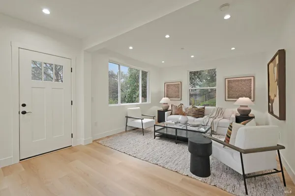 a living room with furniture or couch and a window