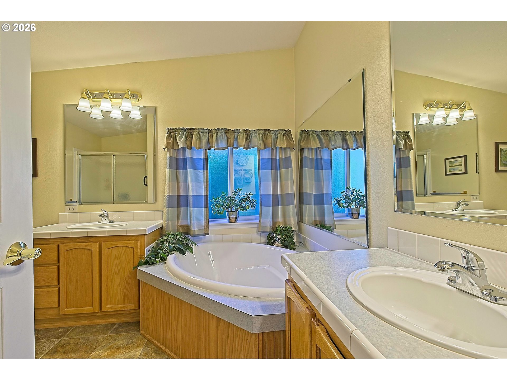 1630 Wallace Road Northwest Salem, OR 97304 - Photo 16 of 24 a bathroom with a sink and a mirror