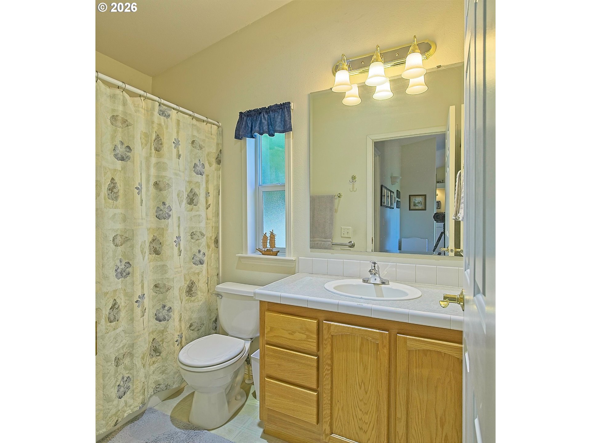 1630 Wallace Road Northwest Salem, OR 97304 - Photo 19 of 24 a bathroom with a granite countertop sink toilet and shower