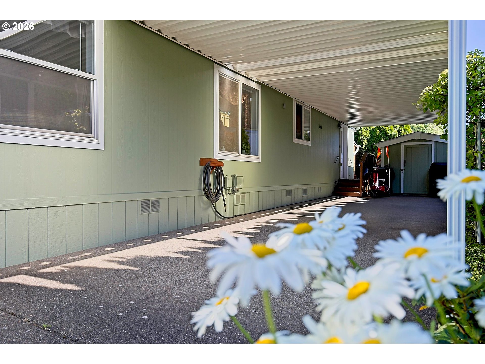 1630 Wallace Road Northwest Salem, OR 97304 - Photo 3 of 24 a front view of a house with a yard