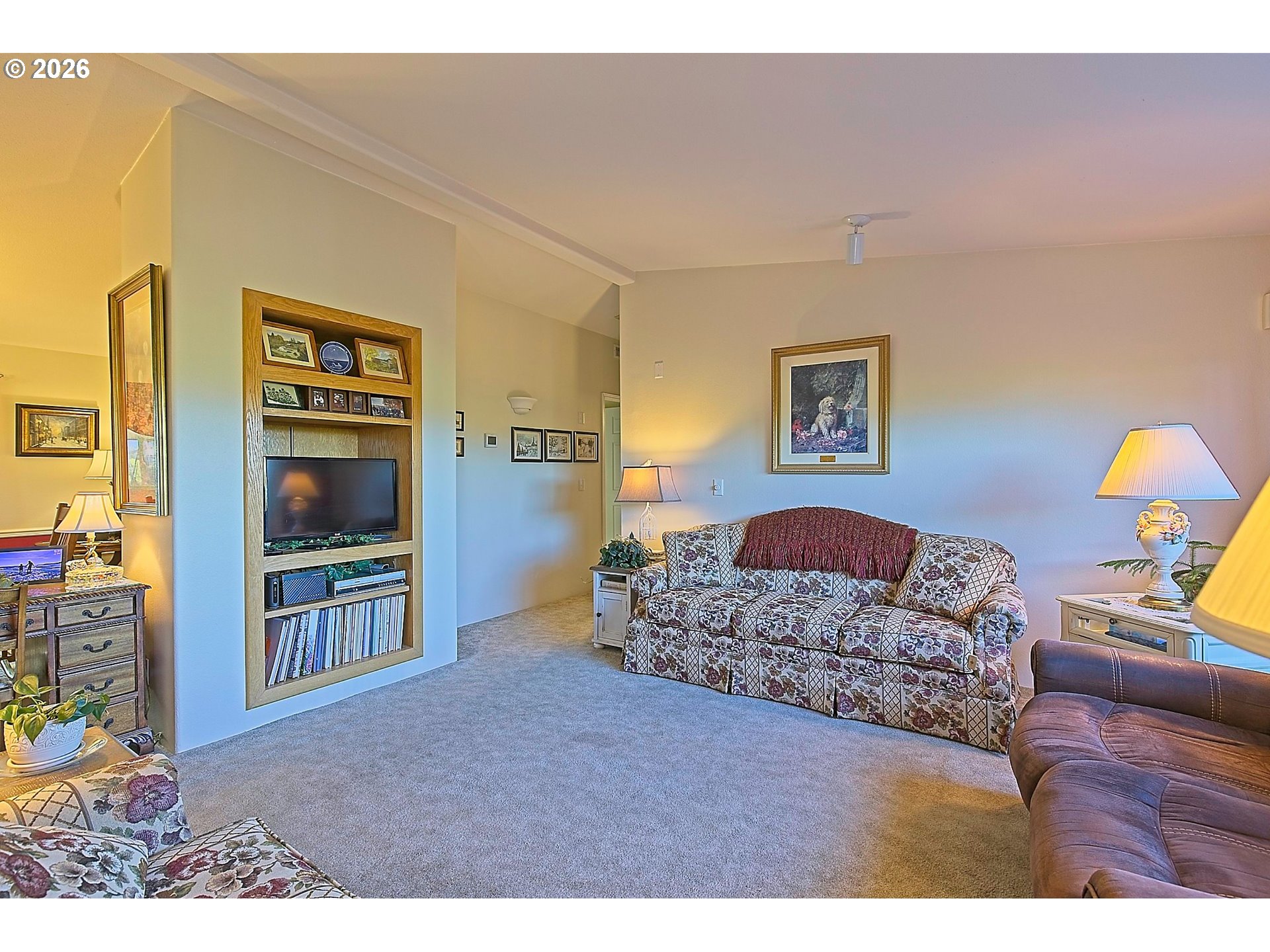 1630 Wallace Road Northwest Salem, OR 97304 - Photo 9 of 24 a living room with furniture and a flat screen tv
