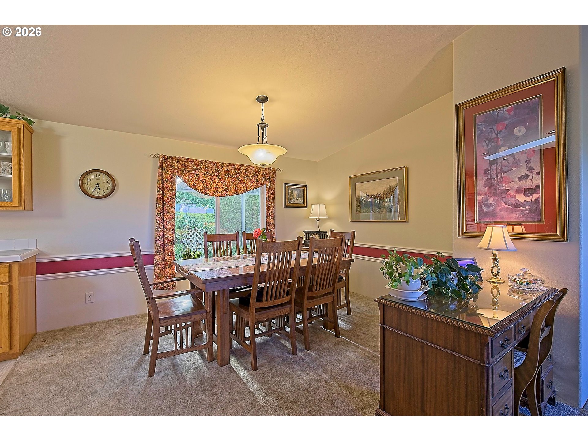 1630 Wallace Road Northwest Salem, OR 97304 - Photo 10 of 24 a view of a dining room with furniture and chandelier