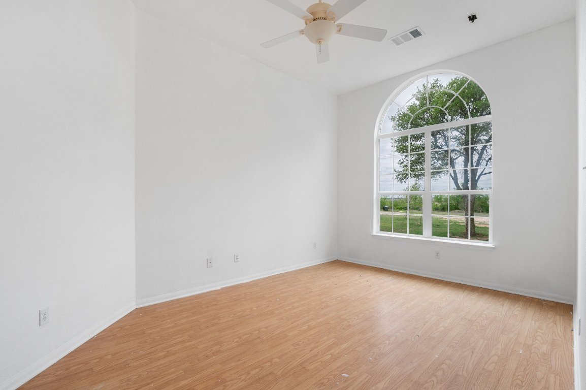 14325 South Turnersville Road Buda, TX 78610 - Photo 13 of 35 Front bedroom has stunning natural light