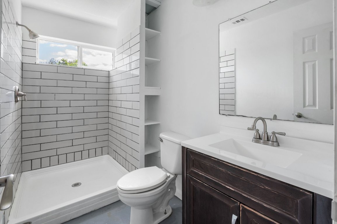 14325 South Turnersville Road Buda, TX 78610 - Photo 21 of 35 Full bath featuring a shower stall and vanity