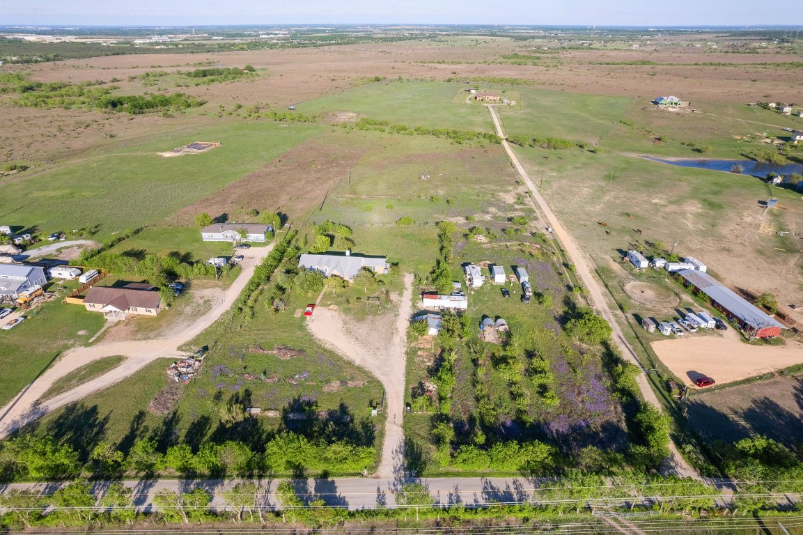 14325 South Turnersville Road Buda, TX 78610 - Photo 35 of 35 Aerial view of sparsely populated area with a nearby body of water