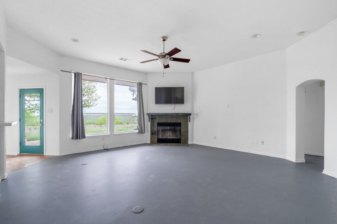 14325 South Turnersville Road Buda, TX 78610 - Photo 7 of 35 View of living room and entrance into den and second bedroom