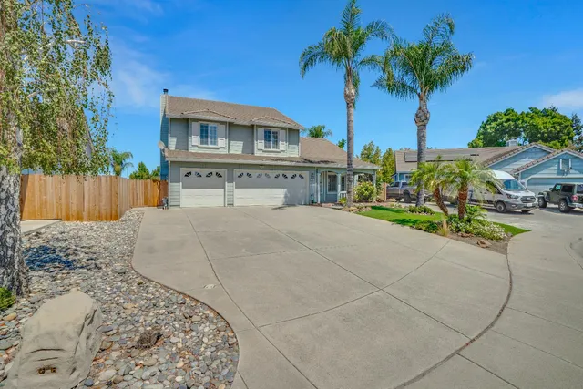 a house view with a garden space