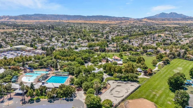 an aerial view of a town with couple of houses